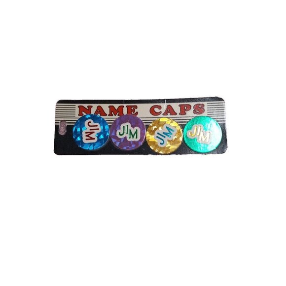 POGS name Milk Caps JIM Bottle Asst Colors pkg of 4 Game New - Picture 1 of 7